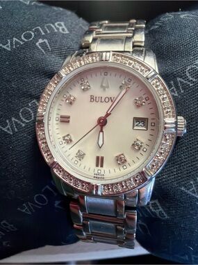 Bulova Women's Silver Crystal Bezel Watch with White Dial